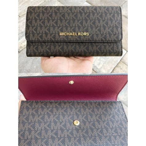 michael kors jet set zip around logo wallet|Michael Kors large trifold wallet.